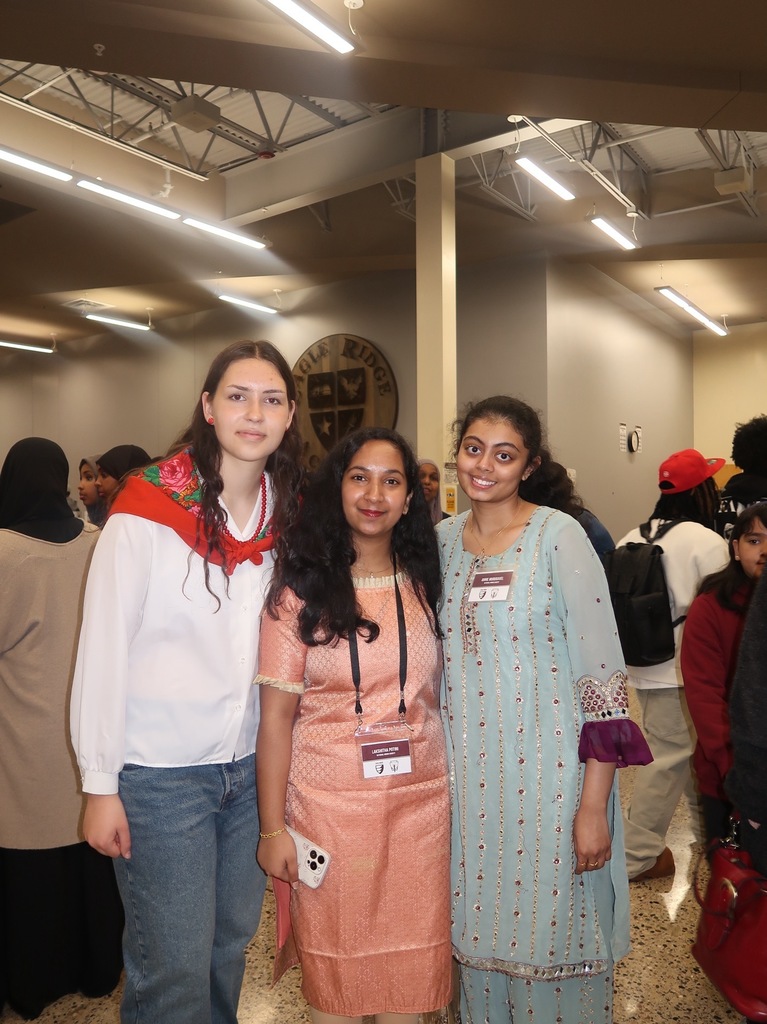 students posing in cultural wear