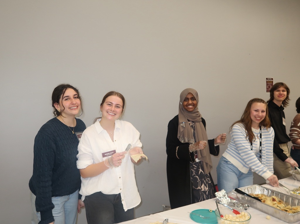 students serving food