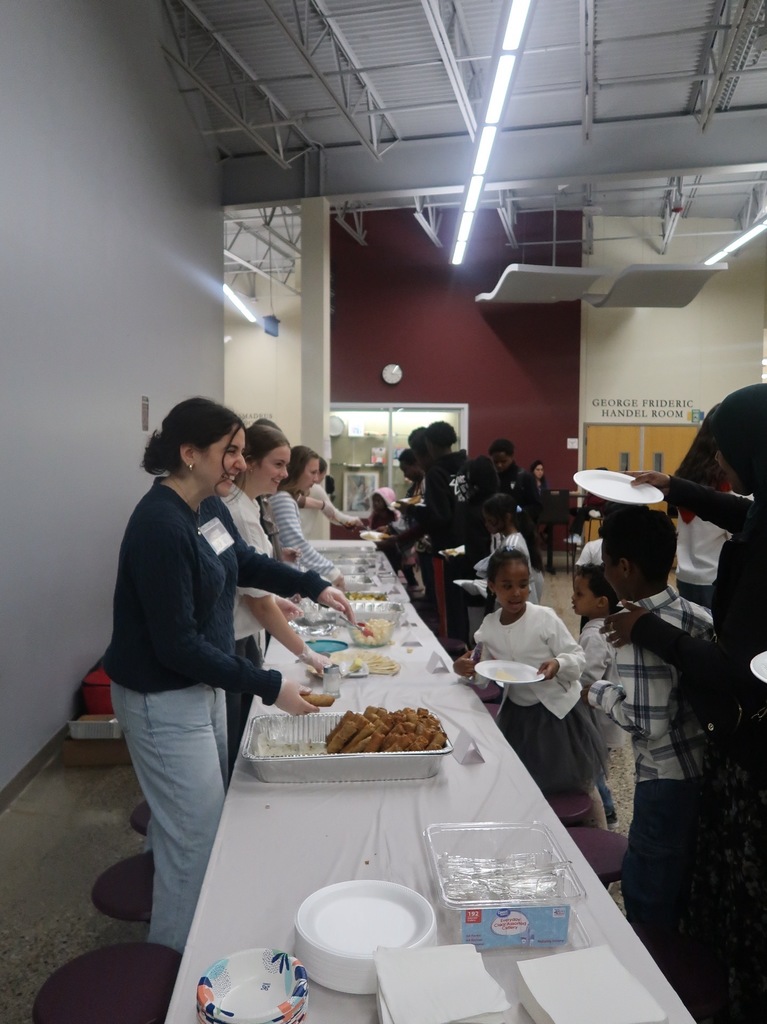 students serving food