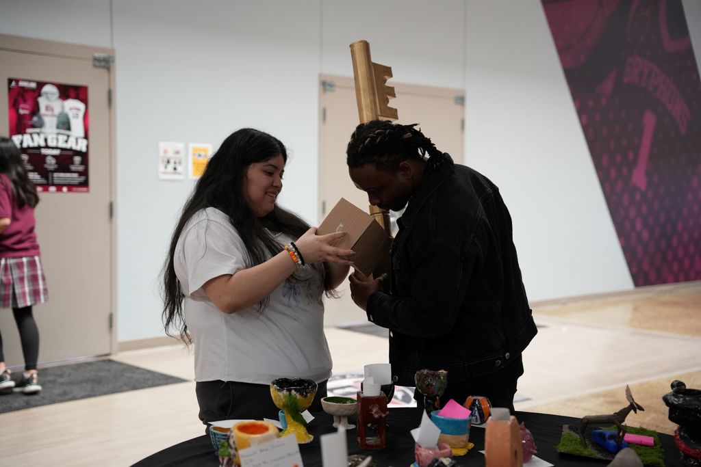 students looking at art