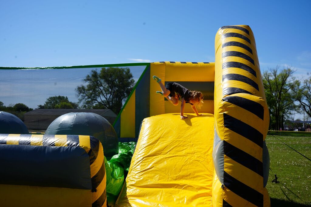 kid on bounce house