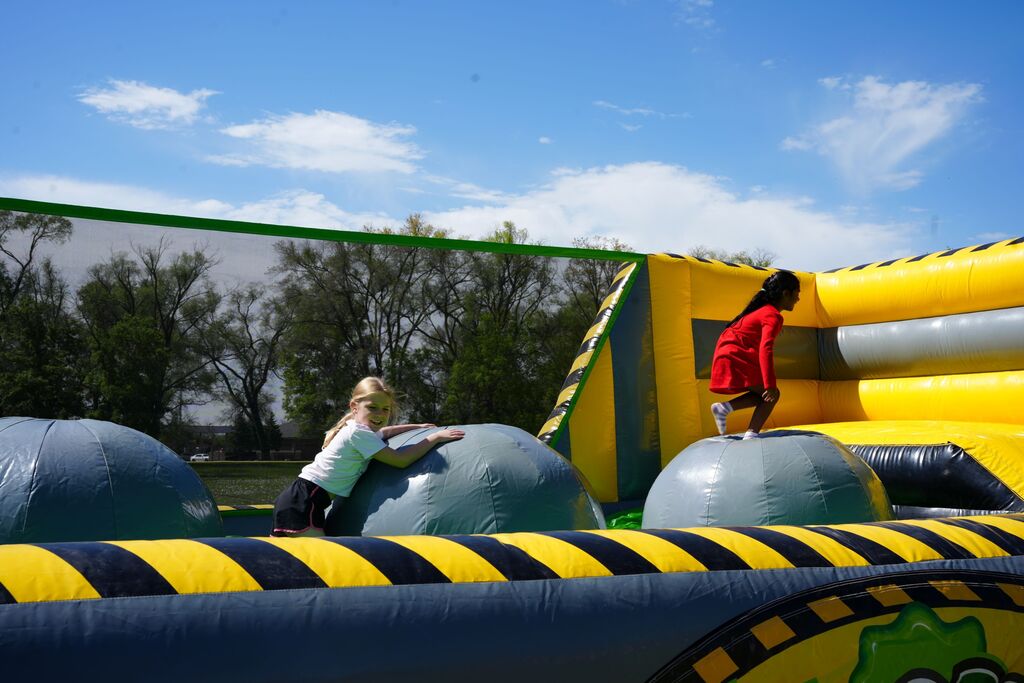 kid on bounce house