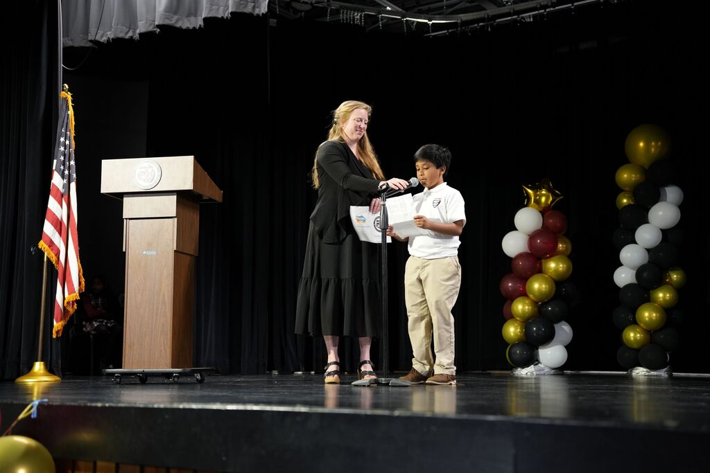 principal with student speaker