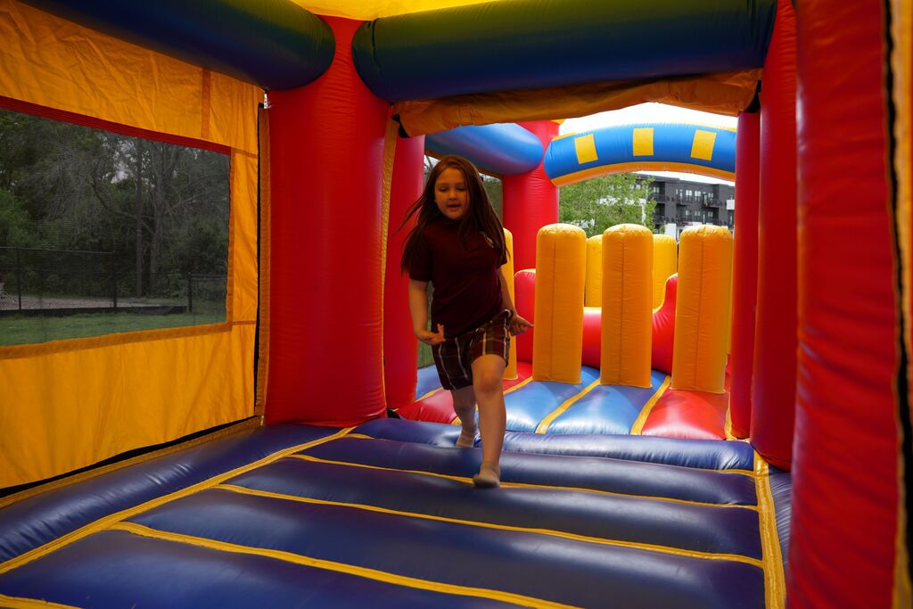 girl in bounce house