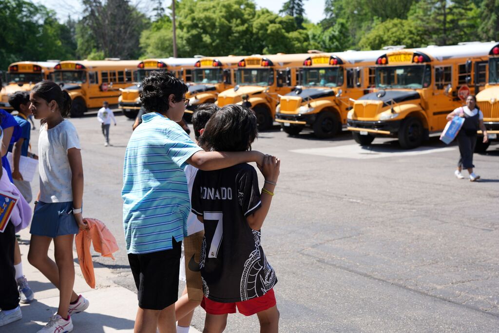 students at buses