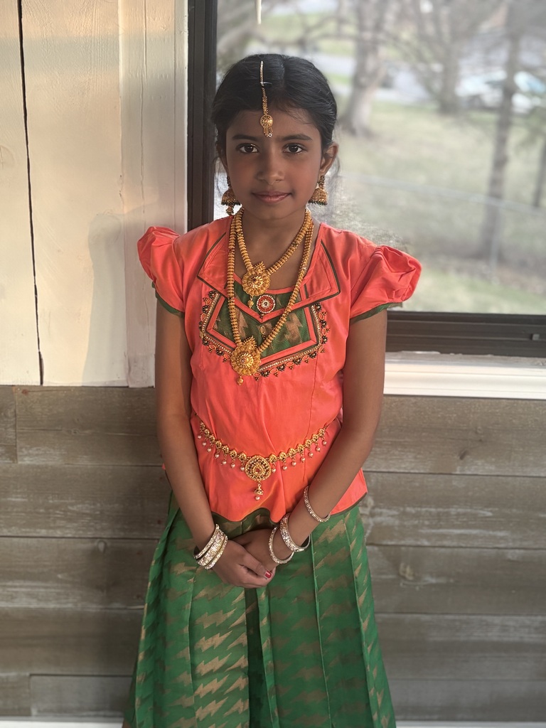 student in traditional wear