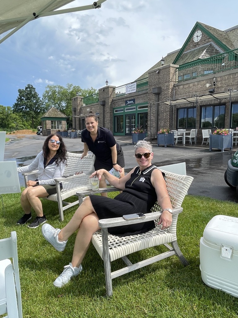 staff members at golf tournament