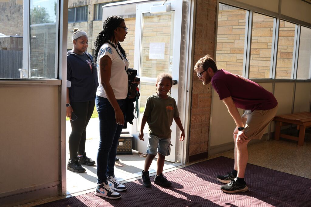 family walking in door