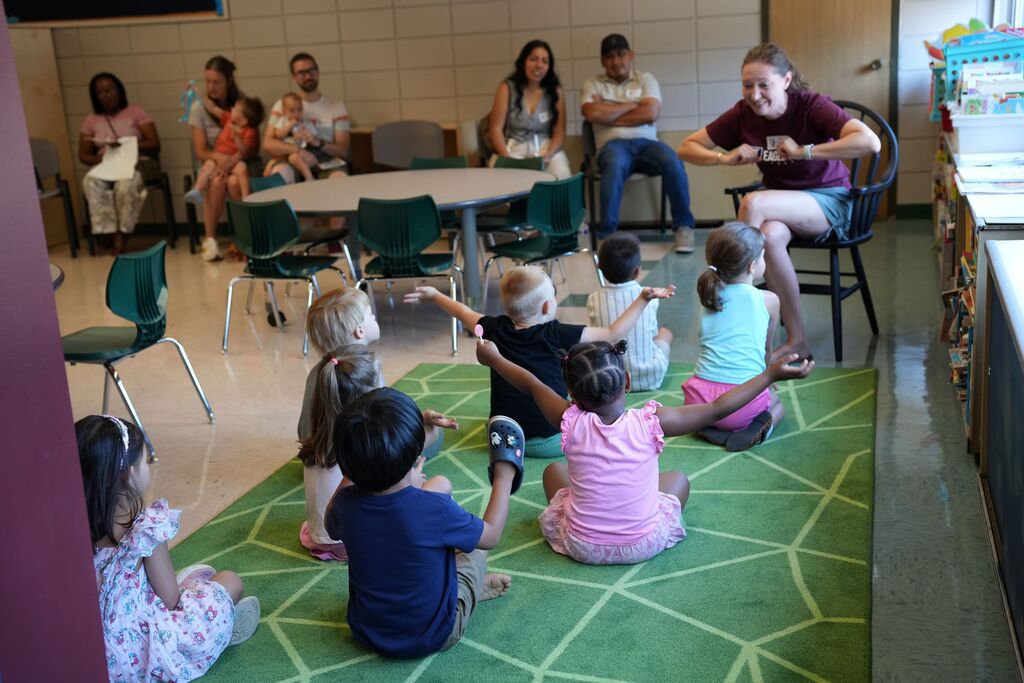 group on kindergarten carpet