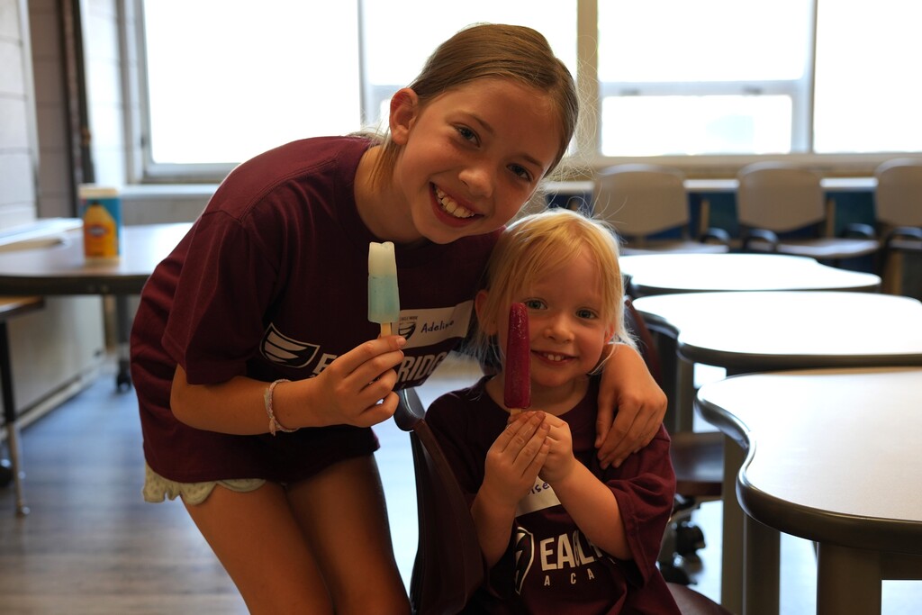 students with popsicles