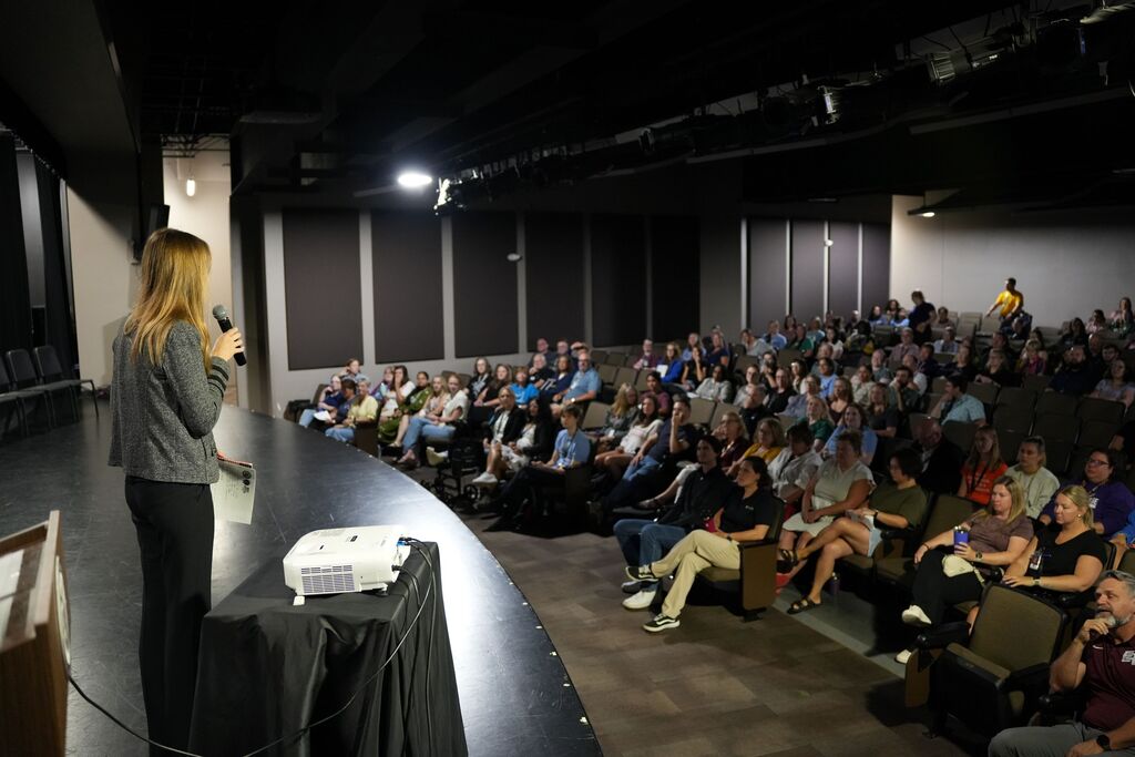 susan speaking to group
