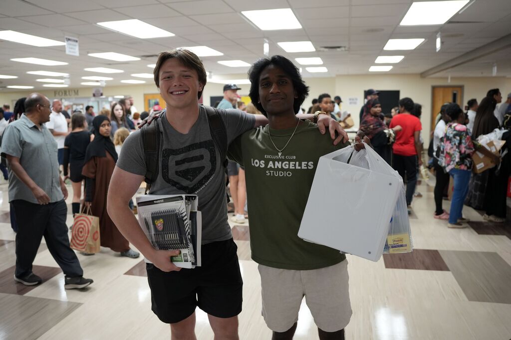 students with school supplies