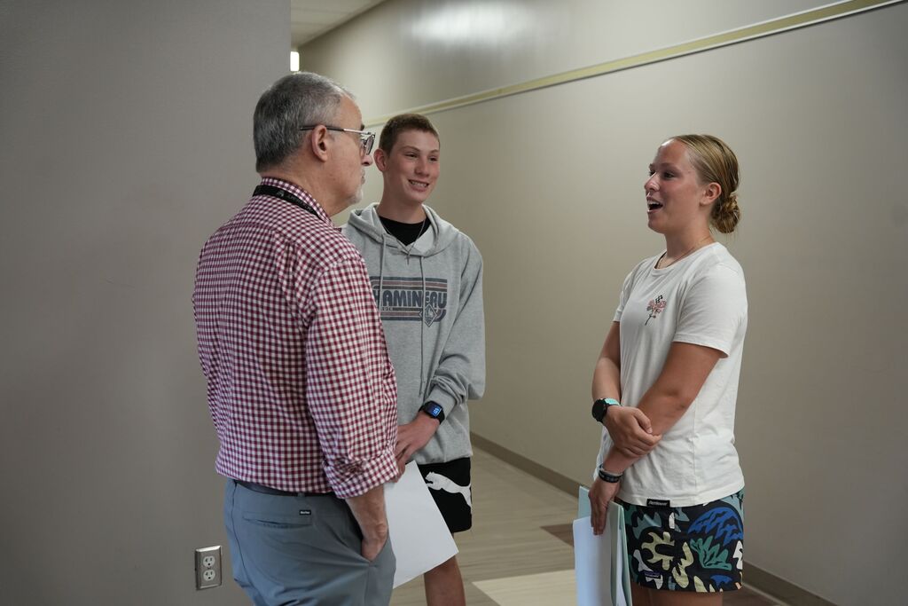 students with teacher