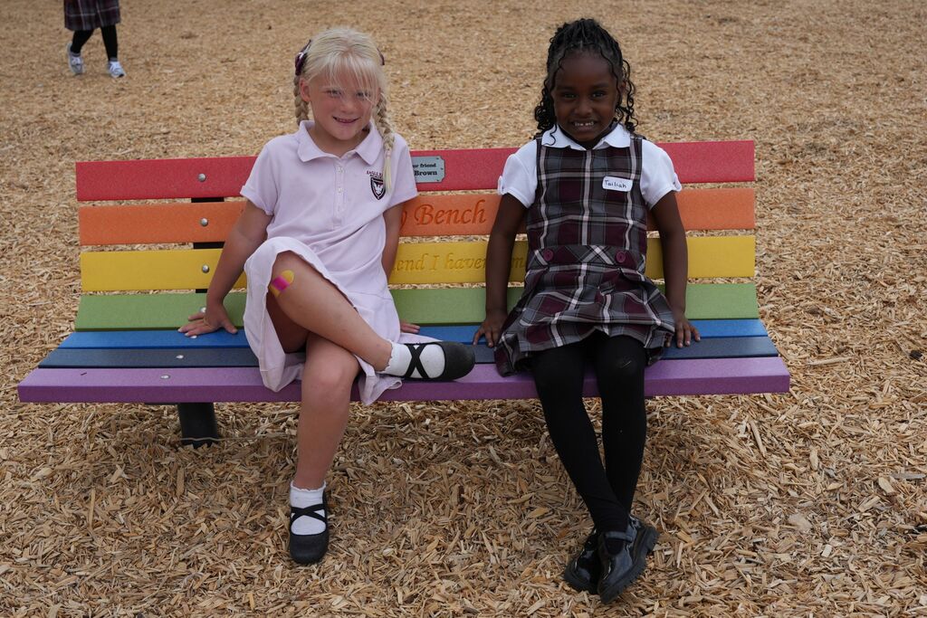 students on buddy bench