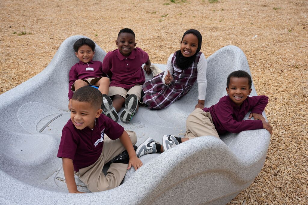 kids on play equipment