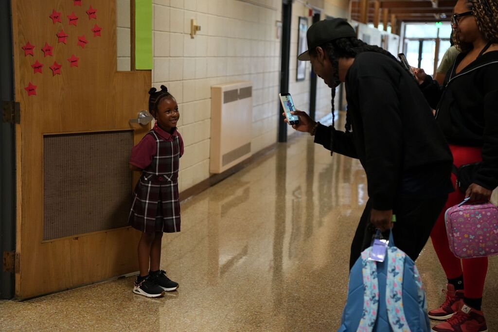 student smiling for dad