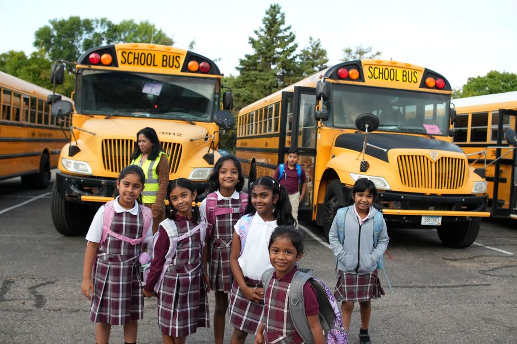 students at bus