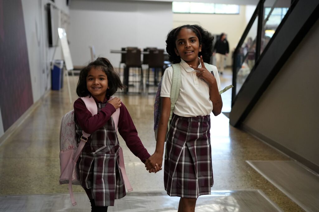 siblings holding hands