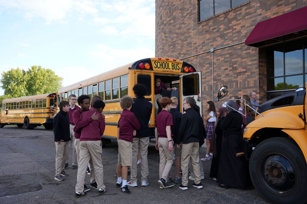 students at bus