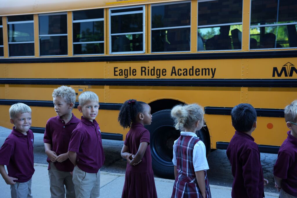 students at bus
