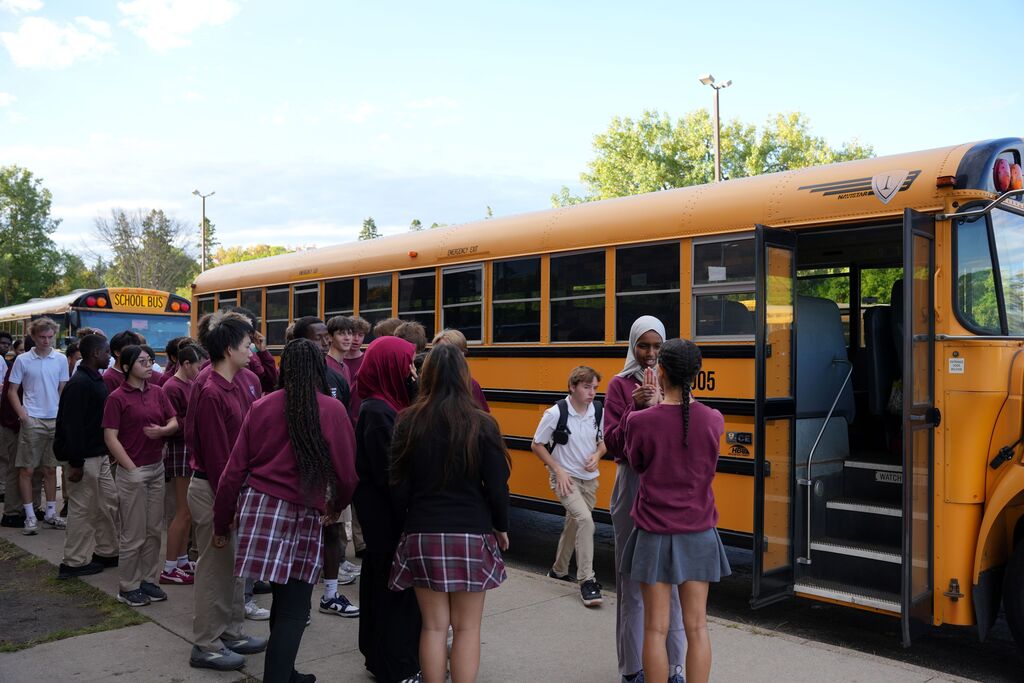 students at bus