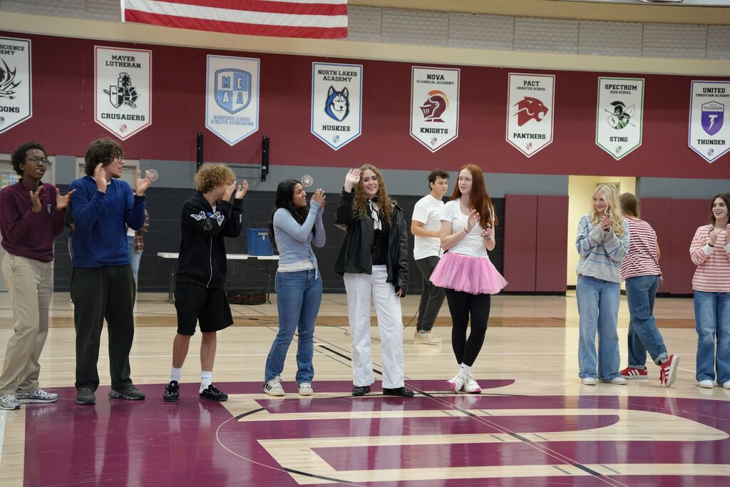 homecoming princess waving
