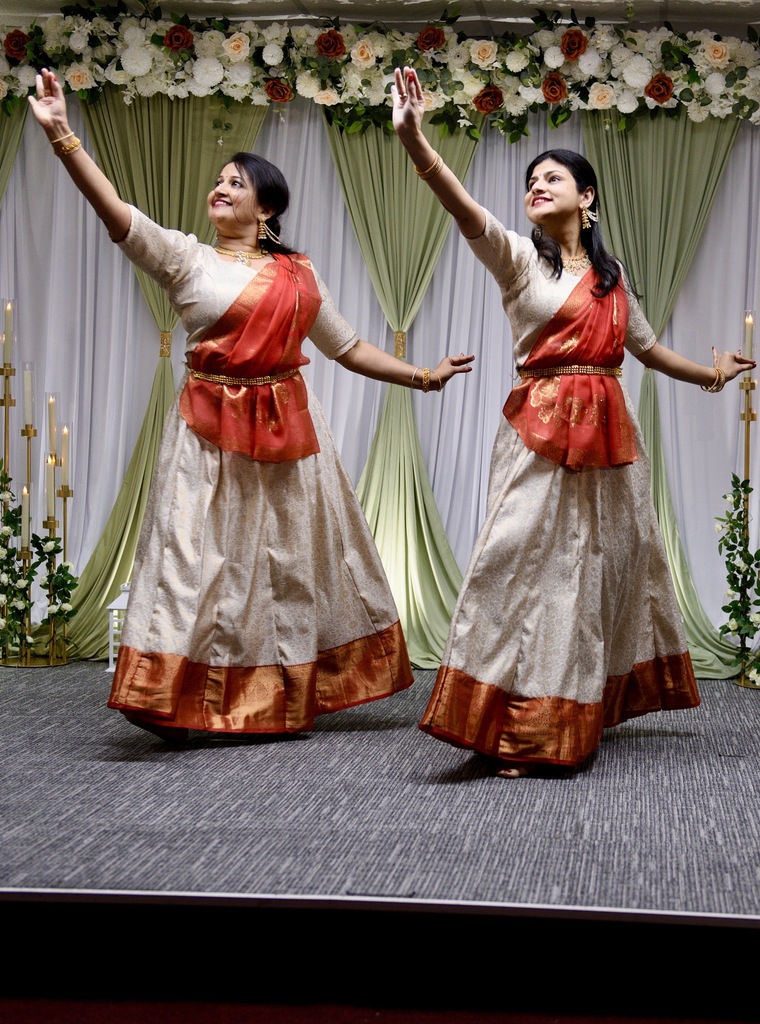 two indian dancers in motion