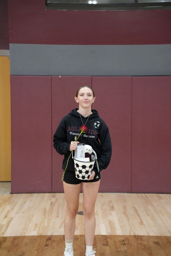 soccer player with rose