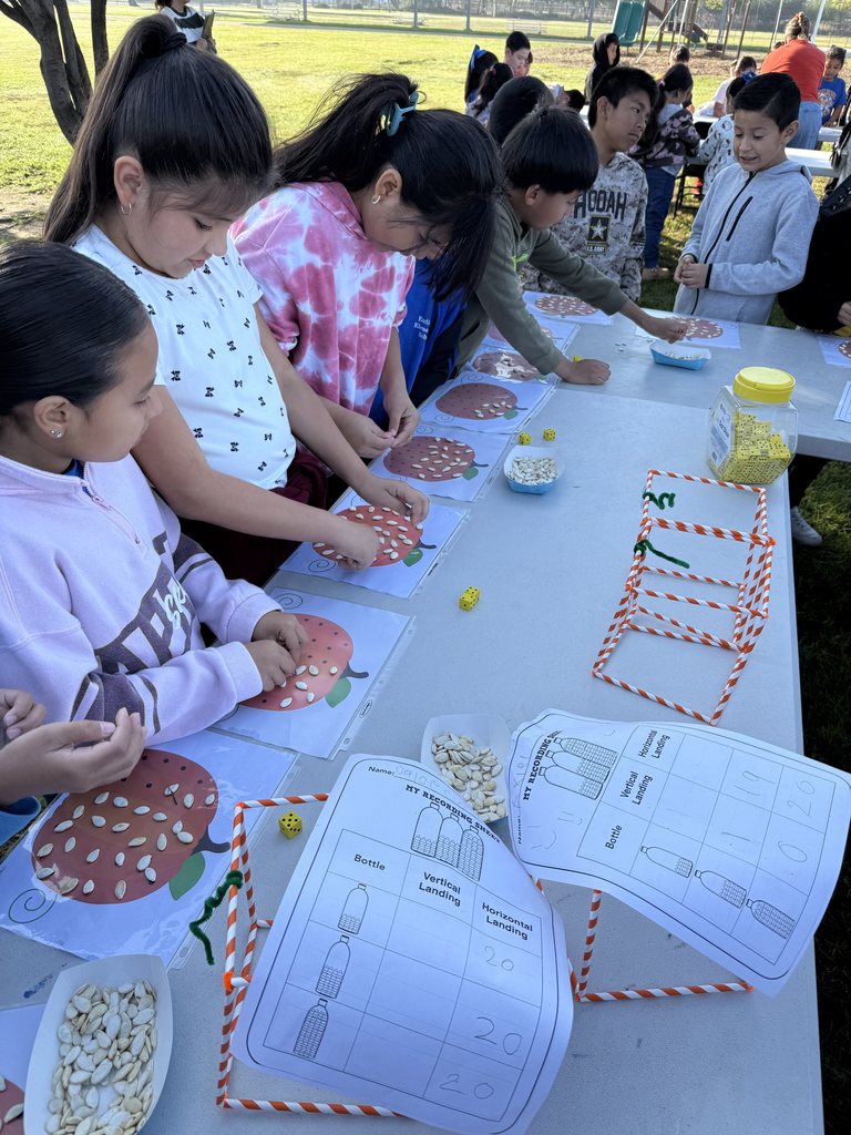 kids working on a pumpkin sheet