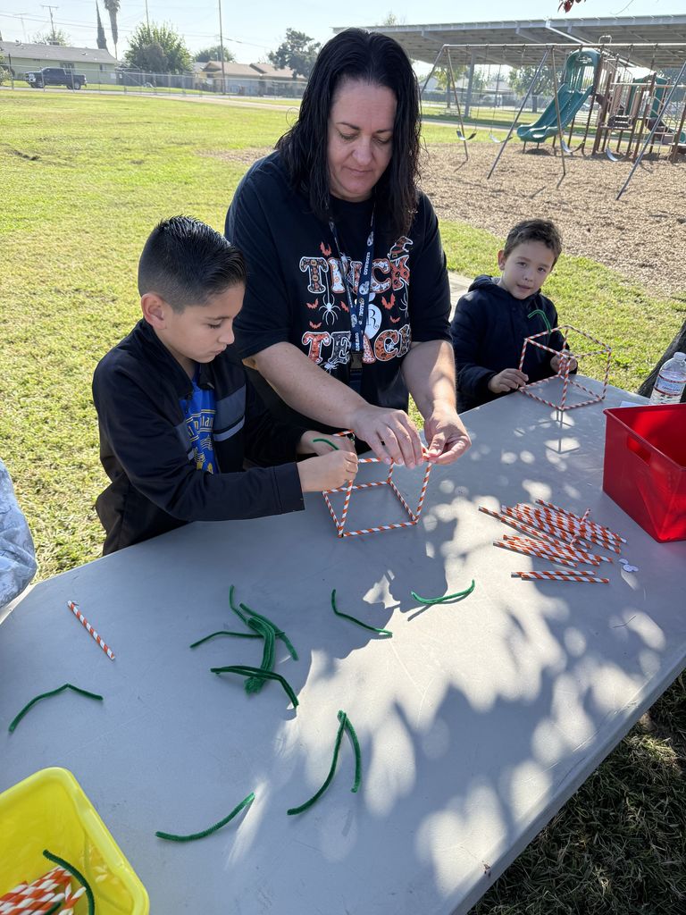 teacher working with a student