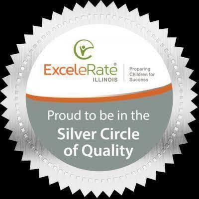Silver circle on black background, "ExceleRate Illinois" logo, text "Proud to be in the Silver Circle of Quality".