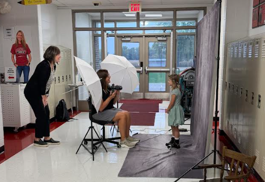 Mrs. Harp and Mrs. Baker take school pictures