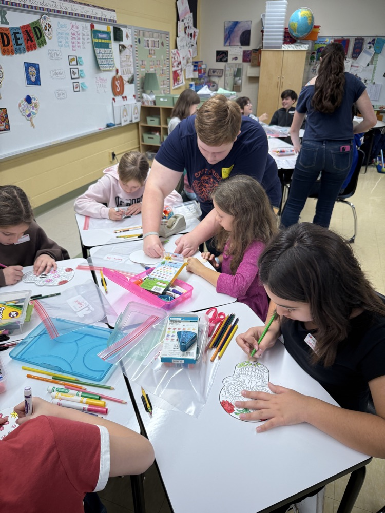 Coloring Day of the Dead masks.