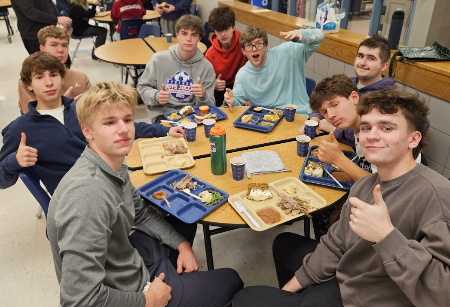 students eating at a table