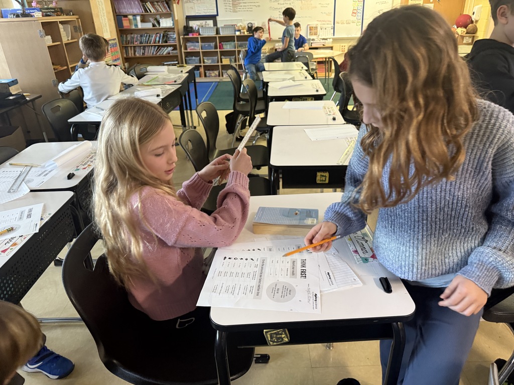 students recording measurements