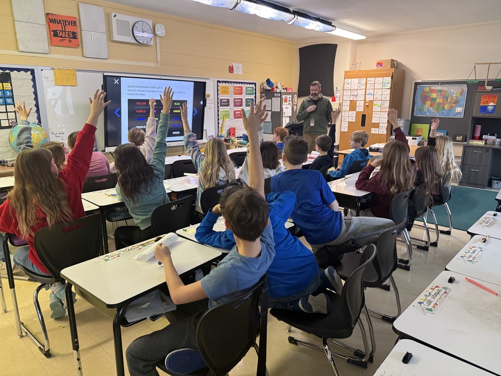 students volunteering for reading colors/words