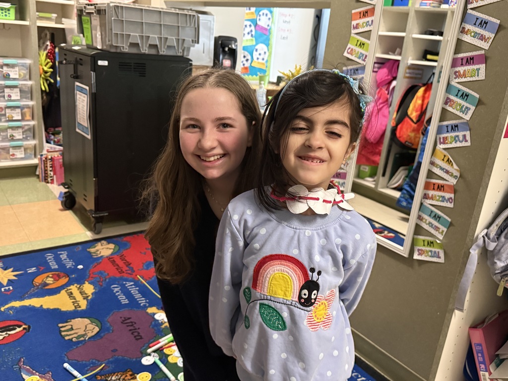 leap leader and parkdae student showing off a necklace