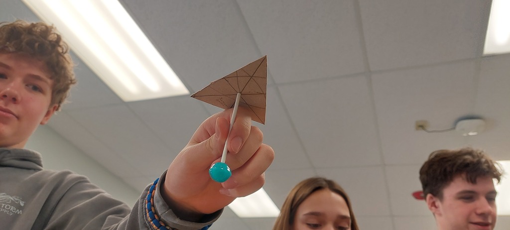 balancing the triangle on a stick