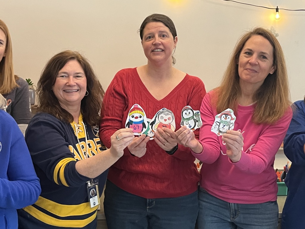 staff members with their panguins