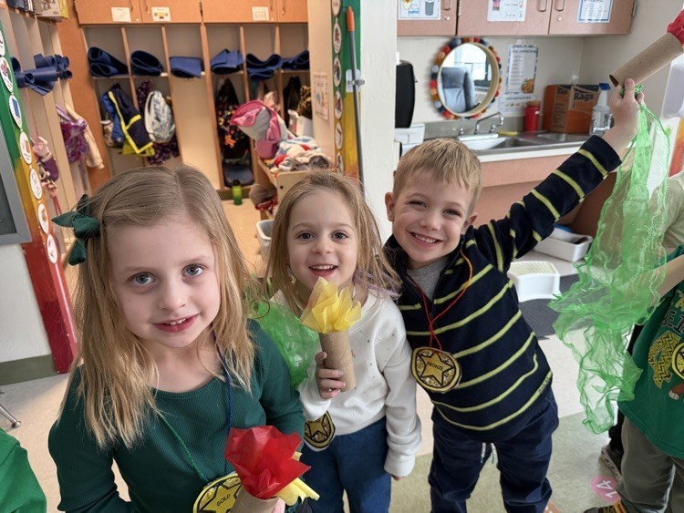 kindergarten students posing with their science projects