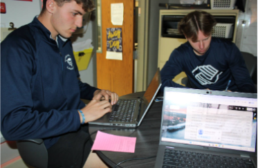 Students working on computers for BDD