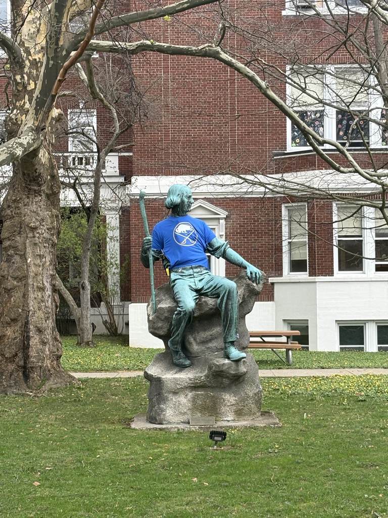 statue wearing sabres gear