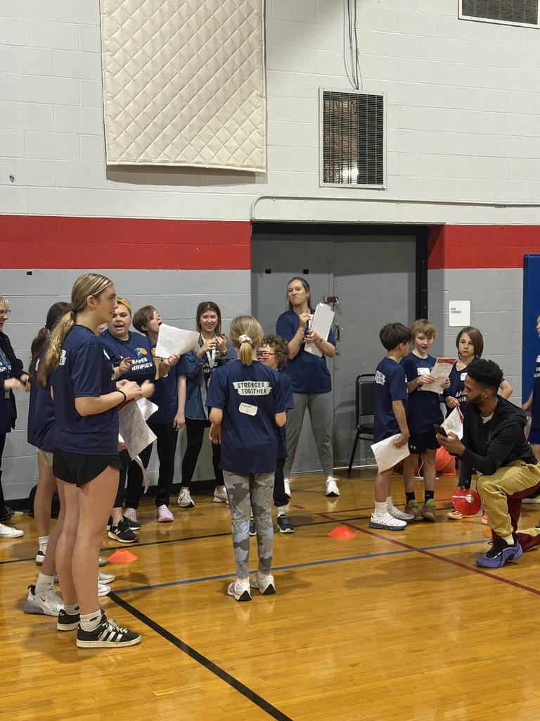 unified students getting ready to play