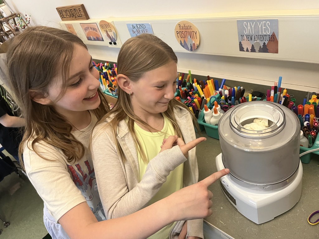 students pointing at the ice cream machine