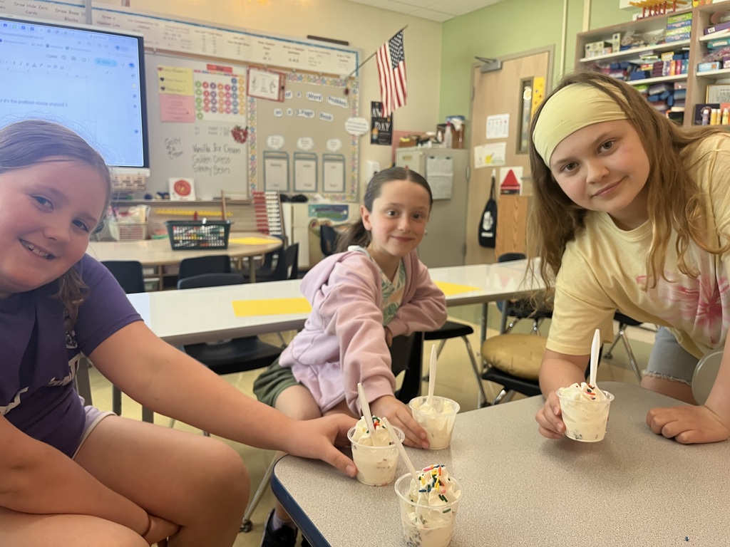 students smiling with their ice cream