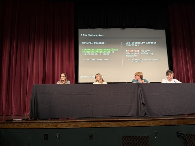student speaking at the symposium