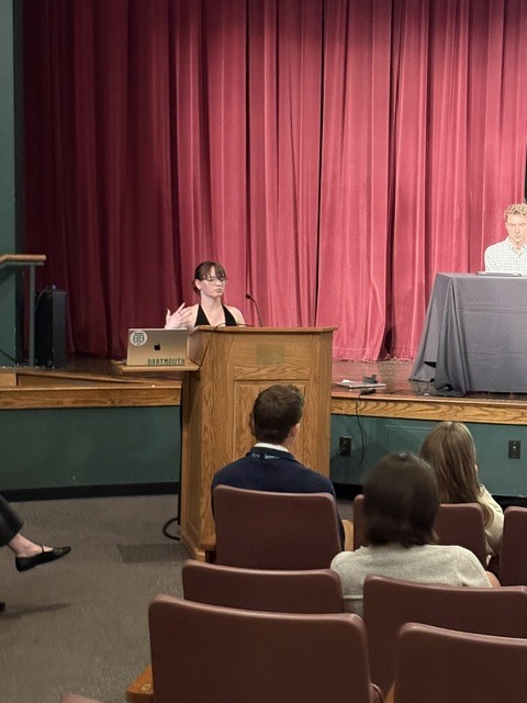 student speaking at the symposium