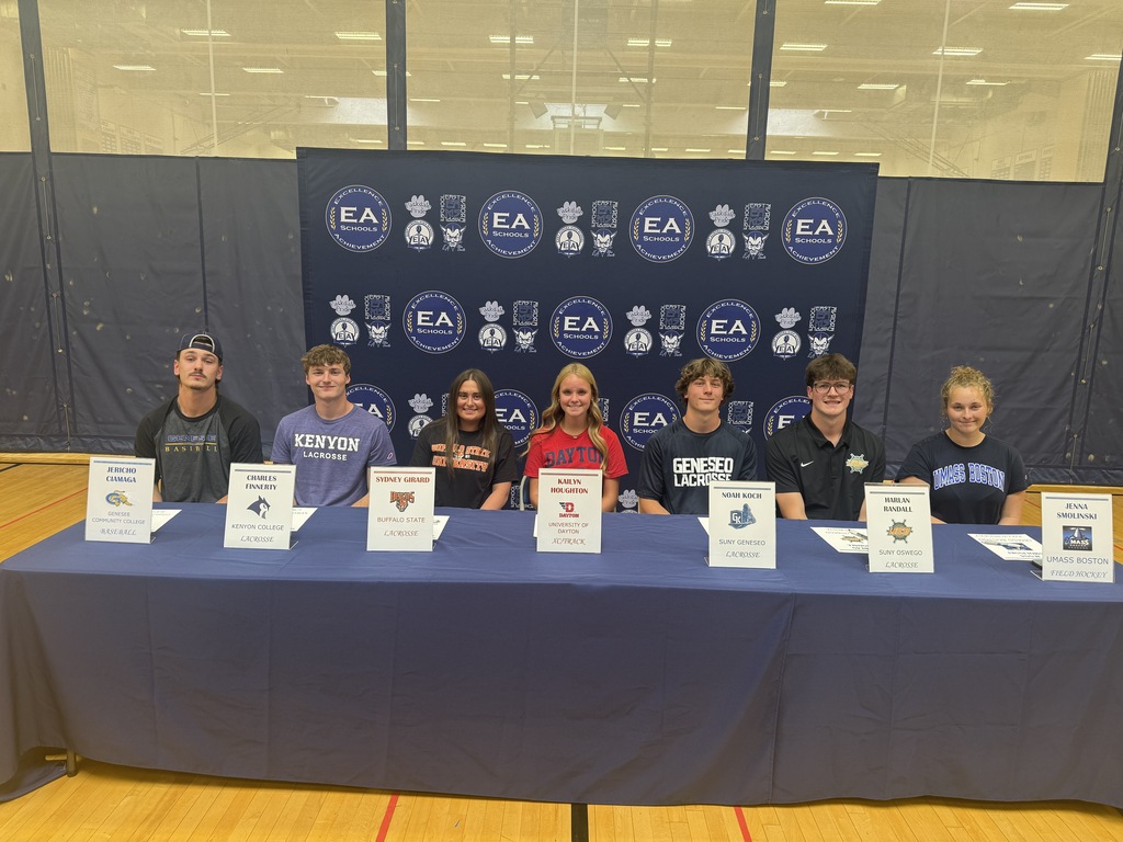 student athletes at the signing table
