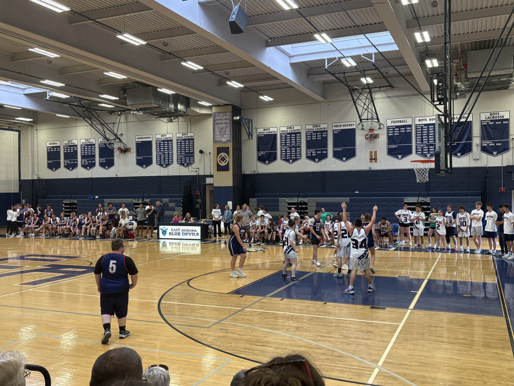 unified basketball game, students playing basketball on the court
