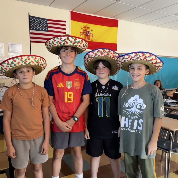 four boys with sombreros
